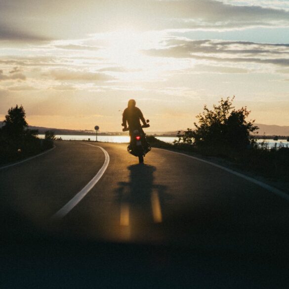 https://www.pexels.com/photo/person-riding-motorcycle-during-golden-hour-1416169/